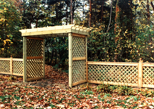 Custom Pergola With Diagonal Lattice By Elyria Fence